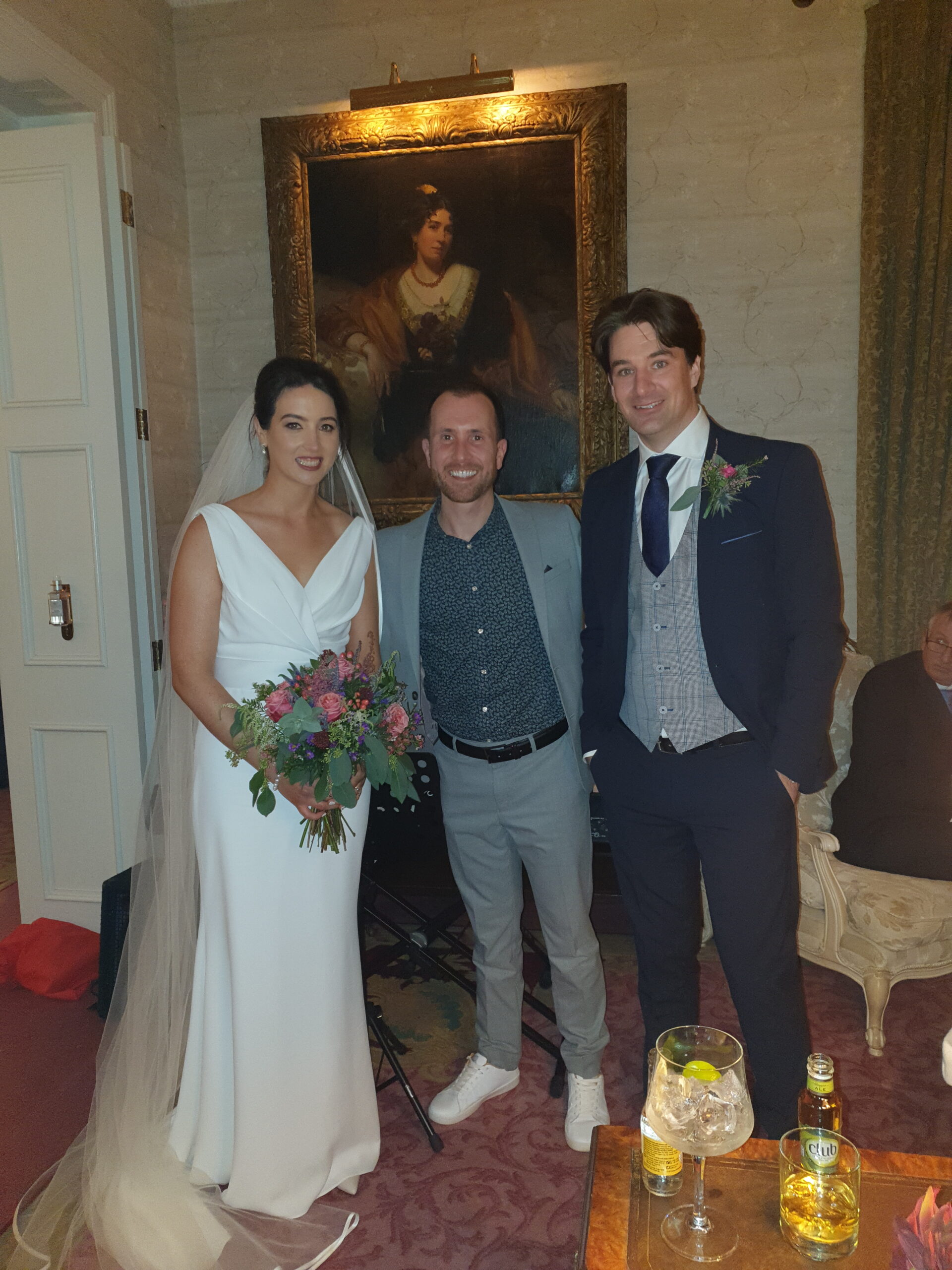 Joe Kenny Pianist with wedding couple in Bellingham Castle after playing over drinks reception